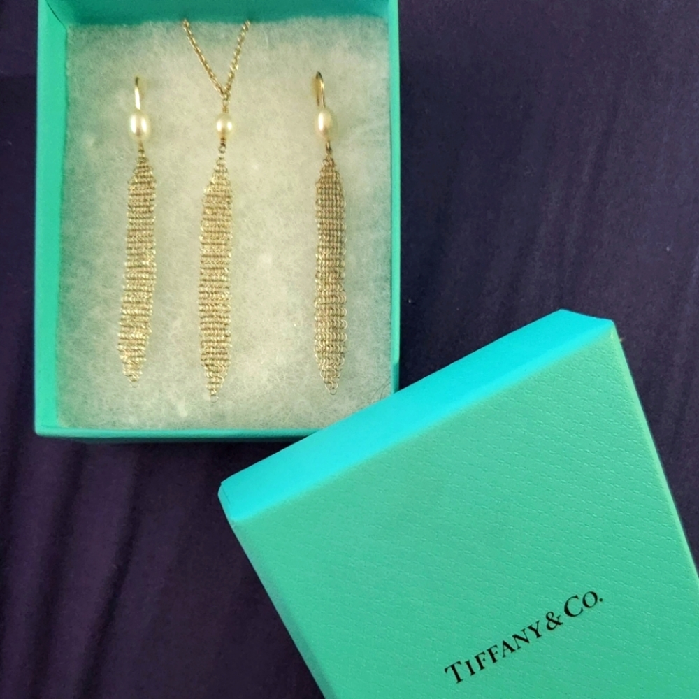Tiffany & Co. Pearl tassel set earrings and necklace.